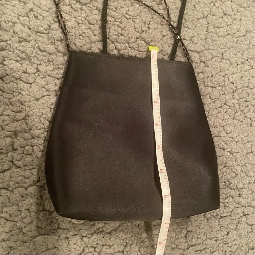 Black Elegant Bag With A Little Beading Hanging In Front